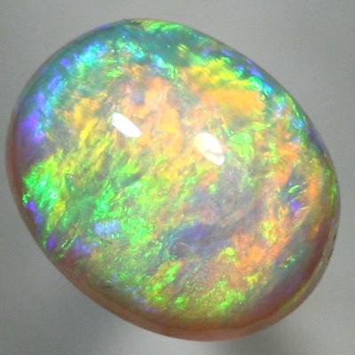 SOLID CRYSTAL OPAL High dome with very bright rolling flash, orange to green. SEE VIDEO